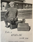 1915 Eastman Kodak Print Ad - Main Waiting at Train Station Rochester NY Luggage