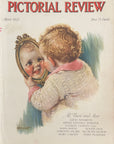 Cover of 'Pictorial Review' magazine featuring a child looking into a mirror with a reflection of a baby.
