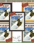 a set of four framed pictures of a skier